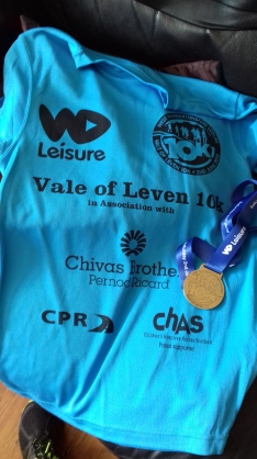tee shirt and medal for a 10k run